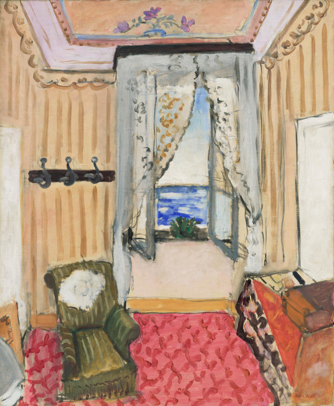 A comfortable room lined in warm colors. A curtained window opens in, beckoning to the distant, quiet sea